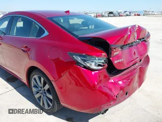 2020 Mazda 6 Grand Touring with VIN JM1GL1TY7L1511054, listed as a IAAI auction lot 41734848 with 70,573 mi miles. Bid and sale history available at carsss.com. Image 6.