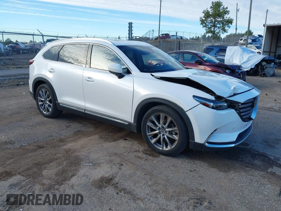 2016 Mazda CX-9 Grand Touring z VIN JM3TCADY4G0124588, wystawiony jako IAAI lot #41192549 z przebiegiem 161 272 mil mil oraz . Historia ofert i sprzedaży dostępna na DreamBid. Obrazek 1.