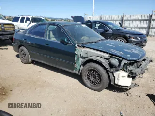 2000 Acura Integra z VIN JH4DB7668YS003517, wystawiony jako Copart lot #57879515 z przebiegiem 215 901 mil mil oraz Szkoda całkowita • Salvage title. Historia ofert i sprzedaży dostępna na DreamBid. Obrazek 4.