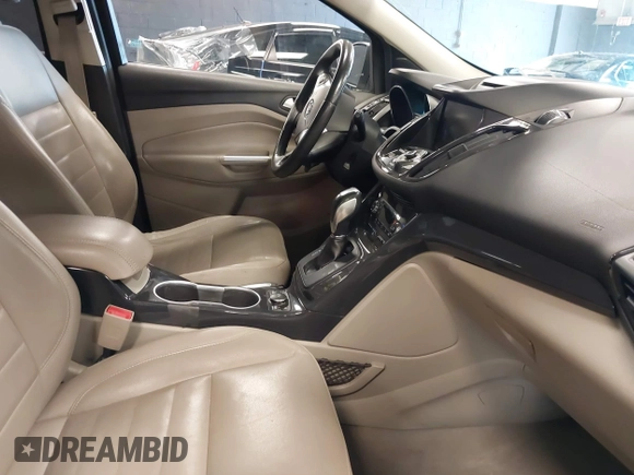 2014 Ford Escape Titanium with VIN 1FMCU9JX0EUE45254, listed as a IAAI auction lot 42038700 with 60,103 mi miles. Bid and sale history available at carsss.com. Image 5.