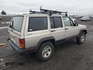 1996 Jeep Cherokee Sport with VIN 1J4FJ68S6TL112962, listed as a Copart auction lot 41540935 with 234,458 mi miles and Salvage Title. Bid and sale history available at carsss.com. Image 3.