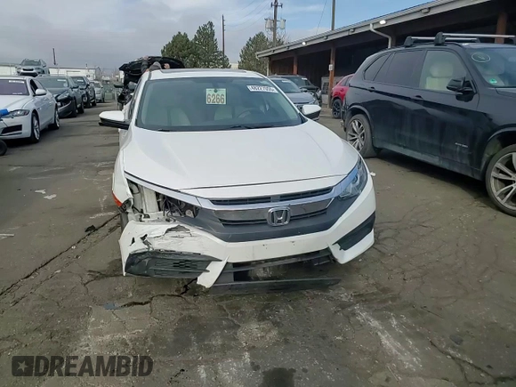 2017 Honda Civic EX z VIN 19XFC2F7XHE209024, wystawiony jako Copart lot #48227055 z przebiegiem 66 661 mil mil oraz Szkody całkowita. Historia ofert i sprzedaży dostępna na DreamBid. Obrazek 11.