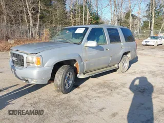 2000 GMC Denali with VIN 1GKEK13R7YR159609, listed as a IAAI auction lot 41828674 with 231,627 mi miles. Bid and sale history available at carsss.com. Image 2.