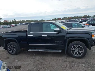 2014 GMC Sierra 1500 SLT with VIN 1GTV2VEJXEZ389280, listed as a IAAI auction lot 41370436 with 124,311 mi miles. Bid and sale history available at carsss.com. Image 13.