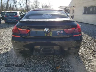 2016 BMW M6 z VIN WBS6E9C55GGF92564, wystawiony jako Copart lot #80727014 z przebiegiem 10 831 mil mil oraz Szkoda całkowita • Salvage title. Historia ofert i sprzedaży dostępna na DreamBid. Obrazek 6.