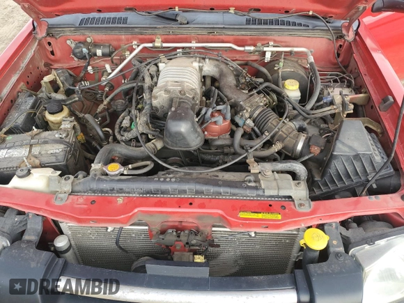 2004 Nissan Frontier SVE with VIN 1N6MD27Y44C459112, listed as a Copart auction lot 81287854 with 99,574 mi miles and Salvage title. Bid and sale history available at DreamBid. Image 11.