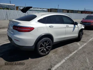 2019 Mercedes-Benz GLC with VIN WDC0J6EB9KF617563, listed as a Copart auction lot 52665394 with 69,419 mi miles and Salvage Title. Bid and sale history available at carsss.com. Image 3.
