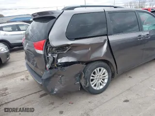 2013 Toyota Sienna XLE AAS with VIN 5TDYK3DC4DS327135, listed as a IAAI auction lot 42026628 with 141,982 mi miles. Bid and sale history available at carsss.com. Image 6.