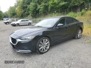 2021 Mazda 6 Grand Touring Reserve with VIN JM1GL1WY8M1616666, listed as a Copart auction lot 68736144 with 33,201 mi miles and Salvage Title. Bid and sale history available at DreamBid. Image 1.