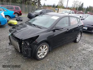 2013 Hyundai Accent SE with VIN KMHCU5AE9DU129485, listed as a IAAI auction lot 41958366 with 63,509 mi miles. Bid and sale history available at carsss.com. Image 18.
