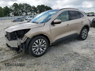 2020 Ford Escape Titanium Hybrid with VIN 1FMCU0DZ0LUC18460, listed as a Copart auction lot 57671085 with 97,587 mi miles and Salvage title. Bid and sale history available at DreamBid. Image 1.