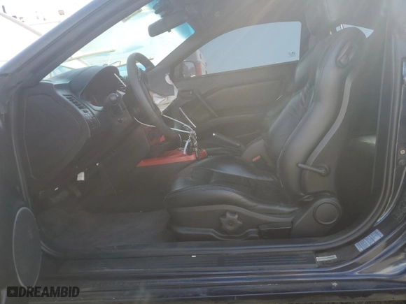 2004 Hyundai Tiburon GT with VIN KMHHN65FX4U108253, listed as a Copart auction lot 77635034 with 34,170 mi miles and Salvage Title. Bid and sale history available at carsss.com. Image 7.