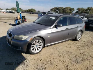 2011 BMW 3 Series 328i with VIN WBAUT9C52BA191581, listed as a Copart auction lot 82901954 with 164,378 mi miles and Clean title. Bid and sale history available at DreamBid. Image 1.