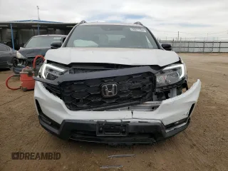 2023 Honda Passport Elite with VIN 5FNYF8H05PB013536, listed as a Copart auction lot 50671155 with 33,815 mi miles and Salvage Title. Bid and sale history available at DreamBid. Image 5.