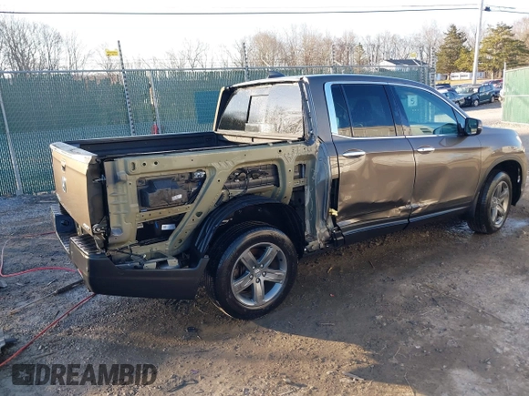 2022 Honda Ridgeline RTL-E with VIN 5FPYK3F79NB005152, listed as a IAAI auction lot 41754891 with 60,191 mi miles and . Bid and sale history available at DreamBid. Image 4.