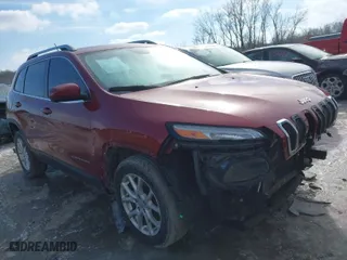 2015 Jeep Cherokee Latitude with VIN 1C4PJLCB8FW612284, listed as a IAAI auction lot 41578838 with 101,458 mi miles. Bid and sale history available at carsss.com. Image 1.