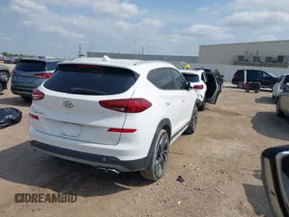 2019 Hyundai Tucson Sport with VIN KM8J33AL1KU861698, listed as a IAAI auction lot 42129173 with 100,160 mi miles. Bid and sale history available at carsss.com. Image 4.