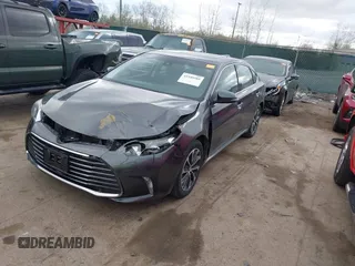 2018 Toyota Avalon XLE with VIN 4T1BK1EB9JU275097, listed as a IAAI auction lot 41940585 with 119,854 mi miles and . Bid and sale history available at DreamBid. Image 17.