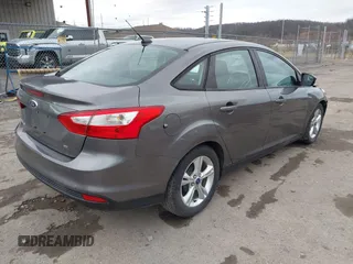 2014 Ford Focus SE with VIN 1FADP3F24EL105899, listed as a IAAI auction lot 41840399 with 90,074 mi miles. Bid and sale history available at carsss.com. Image 4.