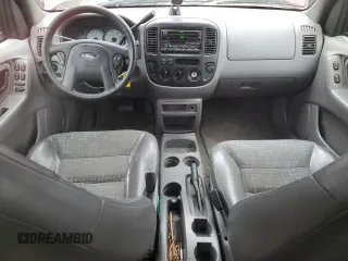 2001 Ford Escape XLS with VIN 1FMYU02181KA64401, listed as a Copart auction lot 44216825 with 196,408 mi miles and Salvage Title. Bid and sale history available at carsss.com. Image 8.