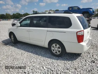 2006 Kia Sedona LX with VIN KNDMB233666057581, listed as a Copart auction lot 71027674 with 206,556 mi miles and Salvage Title. Bid and sale history available at carsss.com. Image 2.