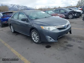2012 Toyota Camry Hybrid XLE with VIN 4T1BD1FK9CU059021, listed as a IAAI auction lot 41932696 with 194,292 mi miles. Bid and sale history available at carsss.com. Image 1.