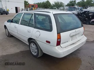 1998 Ford Escort SE with VIN 3FAFP15P2WR201186, listed as a IAAI auction lot 42192477 with 168,216 mi miles and . Bid and sale history available at DreamBid. Image 3.