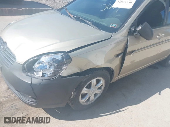 2007 Hyundai Accent GLS with VIN KMHCN46CX7U093034, listed as a IAAI auction lot 41855739 with 152,449 mi miles. Bid and sale history available at carsss.com. Image 6.