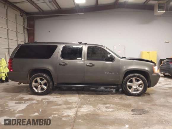 2011 Chevrolet Suburban LT with VIN 1GNSCJE0XBR180270, listed as a IAAI auction lot 41531193 with 202,493 mi miles. Bid and sale history available at carsss.com. Image 13.