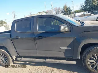 2021 GMC Canyon 2WD Elevation with VIN 1GTG5CEN6M1258058, listed as a IAAI auction lot 41146462 with 147,277 mi miles. Bid and sale history available at carsss.com. Image 14.