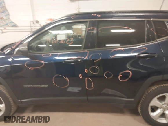 2020 Jeep Compass Latitude with VIN 3C4NJDBB7LT157086, listed as a IAAI auction lot 41263623 with 103,783 mi miles and . Bid and sale history available at DreamBid. Image 14.