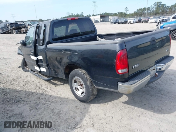 2003 Ford F-150 XL with VIN 1FTRX17W53NB19575, listed as a IAAI auction lot 41711599 with 1 mi miles. Bid and sale history available at carsss.com. Image 3.