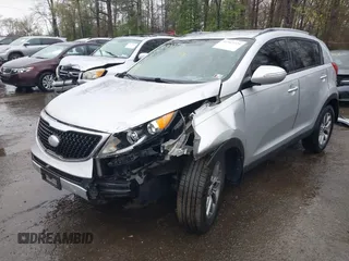 2014 Kia Sportage LX with VIN KNDPB3AC4E7582430, listed as a IAAI auction lot 41947229 with 140,680 mi miles. Bid and sale history available at carsss.com. Image 6.
