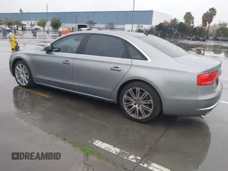 2012 Audi A8 z VIN WAURVAFD5CN008320, wystawiony jako IAAI lot #41508237 z przebiegiem 183 398 mil mil oraz . Historia ofert i sprzedaży dostępna na DreamBid. Obrazek 3.