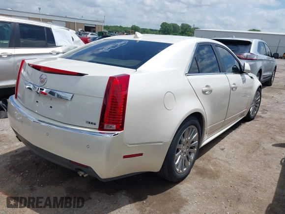 2012 Cadillac CTS Performance z VIN 1G6DK5E34C0116367, wystawiony jako IAAI lot #42373255 z przebiegiem 93 444 mil mil oraz . Historia ofert i sprzedaży dostępna na DreamBid. Obrazek 4.