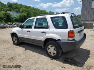 2003 Ford Escape XLS Popular with VIN 1FMYU92163KC43110, listed as a Copart auction lot 58699684 with 66,450 mi miles and Salvage Title. Bid and sale history available at carsss.com. Image 2.