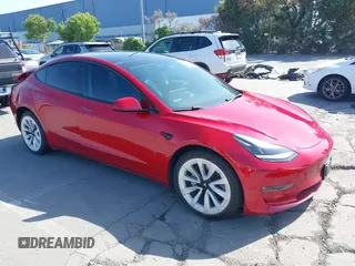 2021 Tesla Model 3 Long Range with VIN 5YJ3E1EB4MF936743, listed as a IAAI auction lot 42154322 with 46,983 mi miles and . Bid and sale history available at DreamBid. Image 1.