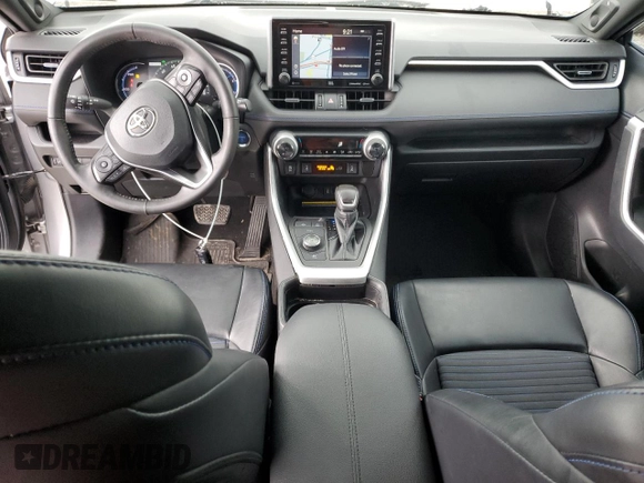 2021 Toyota RAV4 Hybrid XSE with VIN 4T3E6RFV2MU016441, listed as a Copart auction lot 57090975 with 69,304 mi miles and Salvage title. Bid and sale history available at DreamBid. Image 8.