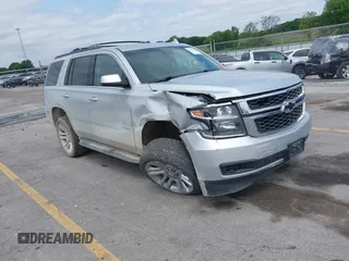 2018 Chevrolet Tahoe LT with VIN 1GNSKBKC3JR159993, listed as a IAAI auction lot 42450836 with 147,411 mi miles and . Bid and sale history available at DreamBid. Image 1.