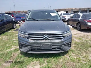 2023 Volkswagen Tiguan SE with VIN 3VVNB7AX2PM064599, listed as a IAAI auction lot 41923005 with Not provided miles and . Bid and sale history available at DreamBid. Image 6.
