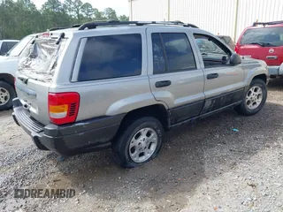 2000 Jeep Grand Cherokee Laredo с VIN 1J4G248S5YC299897, выставлен на аукционе IAAI как лот 41944724 с пробегом Не указан миль и . История ставок и продаж доступна на DreamBid. Изображение 4.
