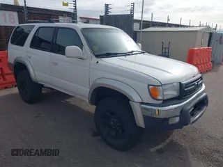 2000 Toyota 4Runner SR5 z VIN JT3HN86RXY0323190, wystawiony jako IAAI lot #41959536 z przebiegiem 354 396 mil mil oraz . Historia ofert i sprzedaży dostępna na DreamBid. Obrazek 1.