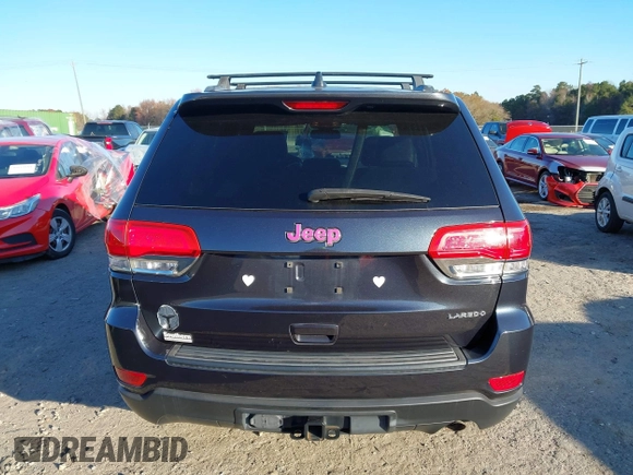 2014 Jeep Grand Cherokee Laredo with VIN 1C4RJEAG3EC218128, listed as a IAAI auction lot 40951611 with 119,596 mi miles and . Bid and sale history available at DreamBid. Image 16.