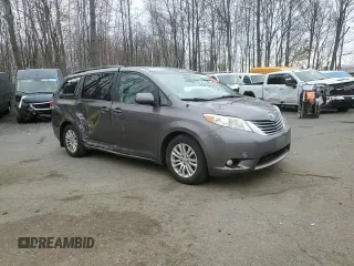 2014 Toyota Sienna XLE with VIN 5TDYK3DC1ES492724, listed as a Copart auction lot 51605245 with 112,079 mi miles and Salvage Title. Bid and sale history available at carsss.com. Image 11.