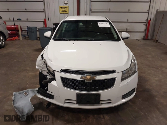 2014 Chevrolet Cruze 1LT z VIN 1G1PC5SB5E7390585, wystawiony jako IAAI lot #42567546 z przebiegiem 119 076 mil mil oraz . Historia ofert i sprzedaży dostępna na DreamBid. Obrazek 13.