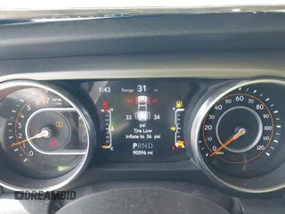 2020 Jeep Gladiator Sport S with VIN 1C6HJTAG7LL128940, listed as a IAAI auction lot 42108154 with 90,596 mi miles and . Bid and sale history available at DreamBid. Image 7.