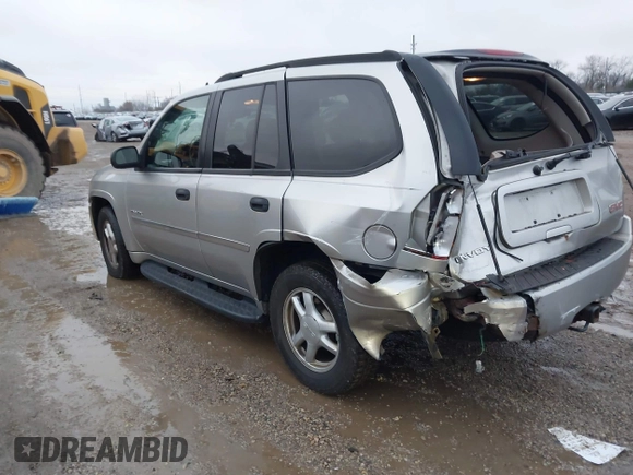 2006 GMC Envoy SLT with VIN 1GKDT13SX62342147, listed as a IAAI auction lot 40873738 with 159,092 mi miles. Bid and sale history available at carsss.com. Image 3.