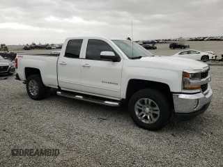 2018 Chevrolet Silverado 1500 LT with VIN 1GCVKREH0JZ368985, listed as a Copart auction lot 49885275 with 73,355 mi miles and Salvage Title. Bid and sale history available at DreamBid. Image 4.
