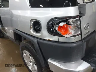 2007 Toyota FJ Cruiser with VIN JTEBU11F470035202, listed as a IAAI auction lot 41972066 with 241,021 mi miles. Bid and sale history available at carsss.com. Image 6.