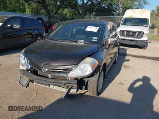 2012 Nissan Versa S with VIN 3N1BC1CP8CK201207, listed as a IAAI auction lot 42064101 with 206,514 mi miles. Bid and sale history available at carsss.com. Image 2.